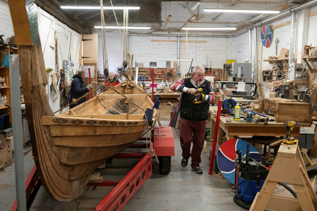 UK military vets rebuild lives carving Viking longboat