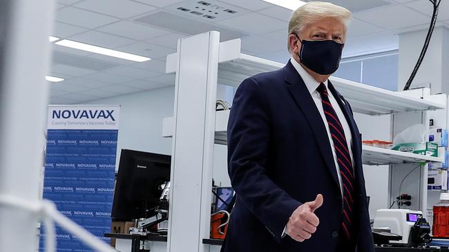 Donald Trump on a tour of the Fujifilm Diosynth Biotechnologies' Innovation Centre, where components for a potential COVID-19 vaccine candidate Novavax are being developed, in Morrrisville, North Carolina. Picture: Reuters