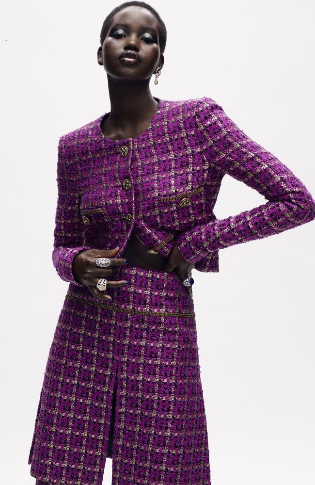 Purple reign! Adut Akech, wearing a Chanel two-piece suit in the design house’s couture presentation. Picture: Mikael Jansson for Chanel