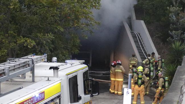 About 40 people had to be evacuated from a unit block in Delmar Pde, Dee Why, after an early morning fire broke out in an underground car park. Picture: News Corp