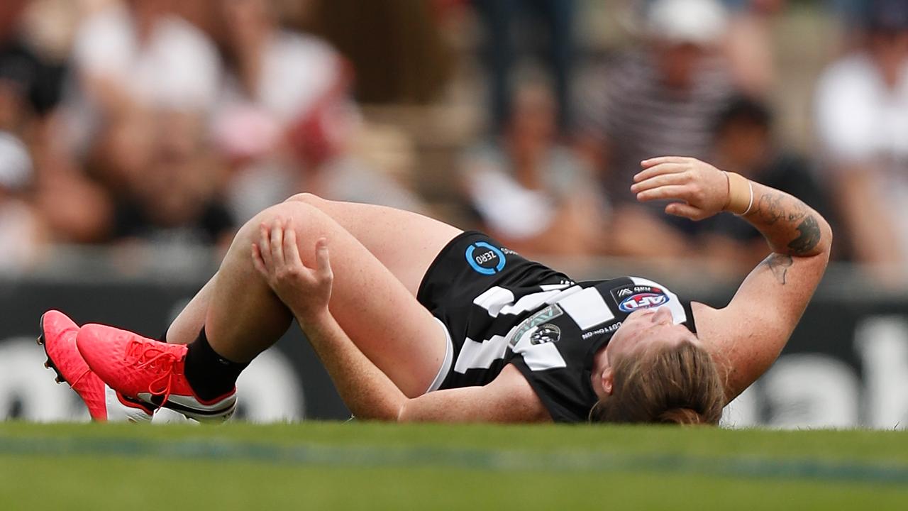 Brianna Davey goes down with an injury. Photo: Michael Willson/AFL Photos via Getty Images