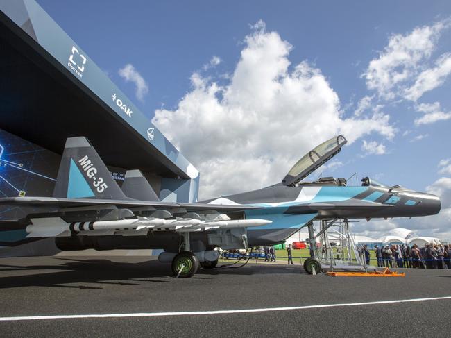 Missiles sit under the wing of a Mikoyan MiG-35 fighter jet on display at the MAKS International Aviation and Space Salon at Zhukovsky International Airport in Moscow, Russia, on Tuesday, Aug. 27, 2019. The Kremlin hinted at possible talks over new arms deals between Russian President Vladimir Putin and Turkish leader Recep Tayyip Erdogan when the two leaders meet at the international air show near Moscow. Photographer: Andrey Rudakov/Bloomberg