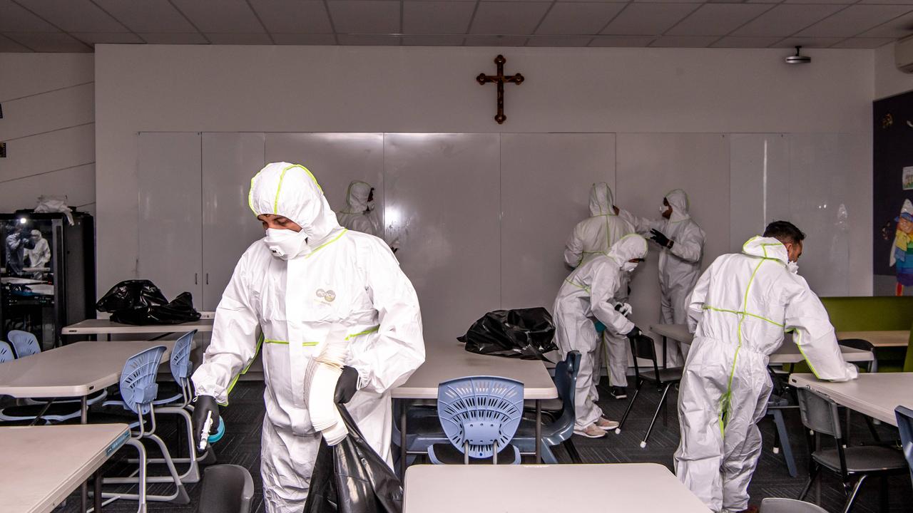 A Sydney classroom is cleaned due to coronavirus fears. Picture: AAP/Monique Harmer