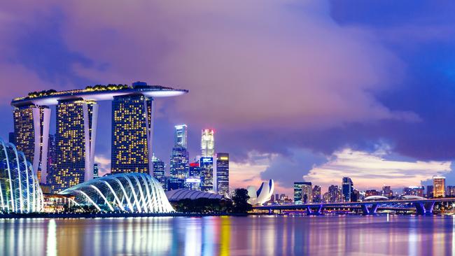 The Singapore skyline at night.