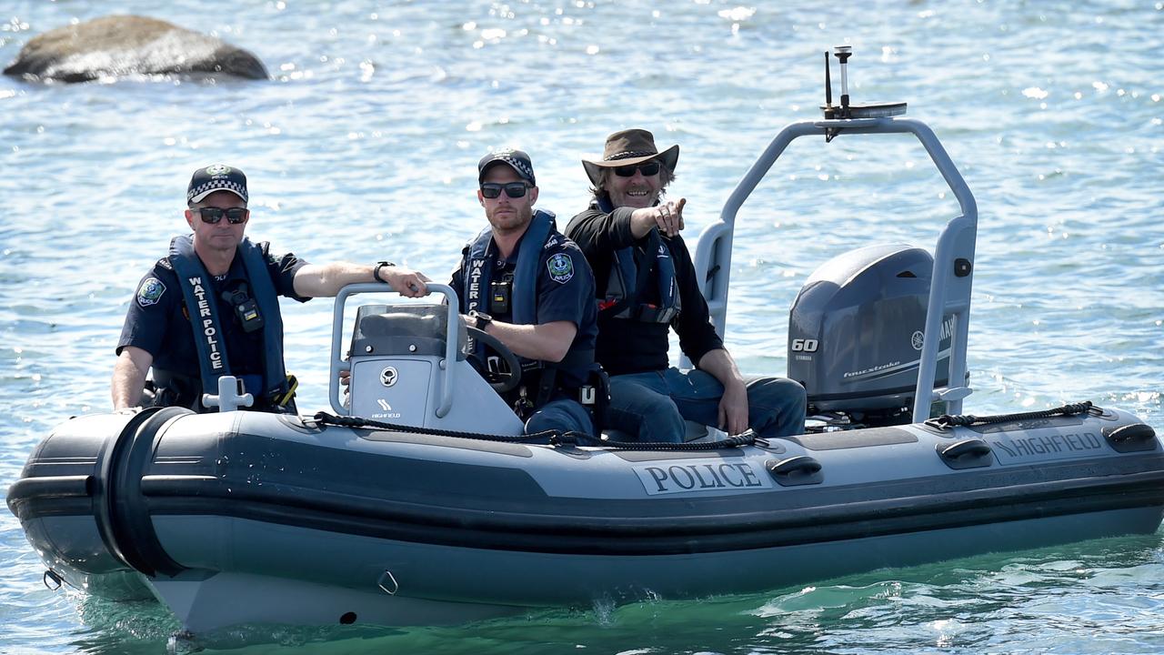 Derek Robinson is brought ashore. Picture: NCA NewsWire / Picture: Naomi Jellicoe