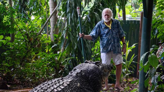 George Craig and Cassius the crocodile on Green Island. Picture: Brian Cassey