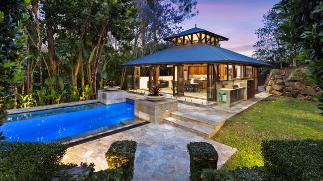 The pool house created with a full kitchen, bathroom, gym and barbecue zone.