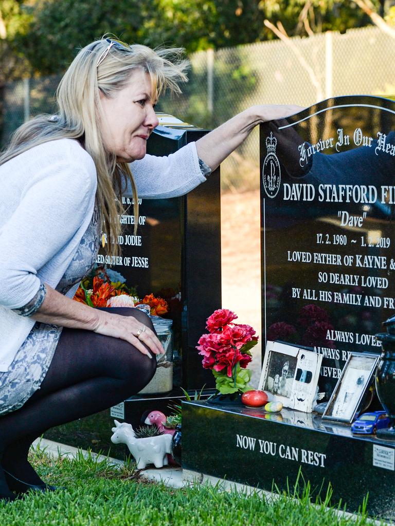 Julie-Ann Finney visits the grave of her son Dave at the Golden Grove Cemetery after the Prime Minister announced a Royal Commission into veteran suicides. Picture: NCA NewsWire / Brenton Edwards