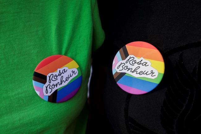 The tent dotted with rainbow-themed paraphanalia hopes to draw in the crowds