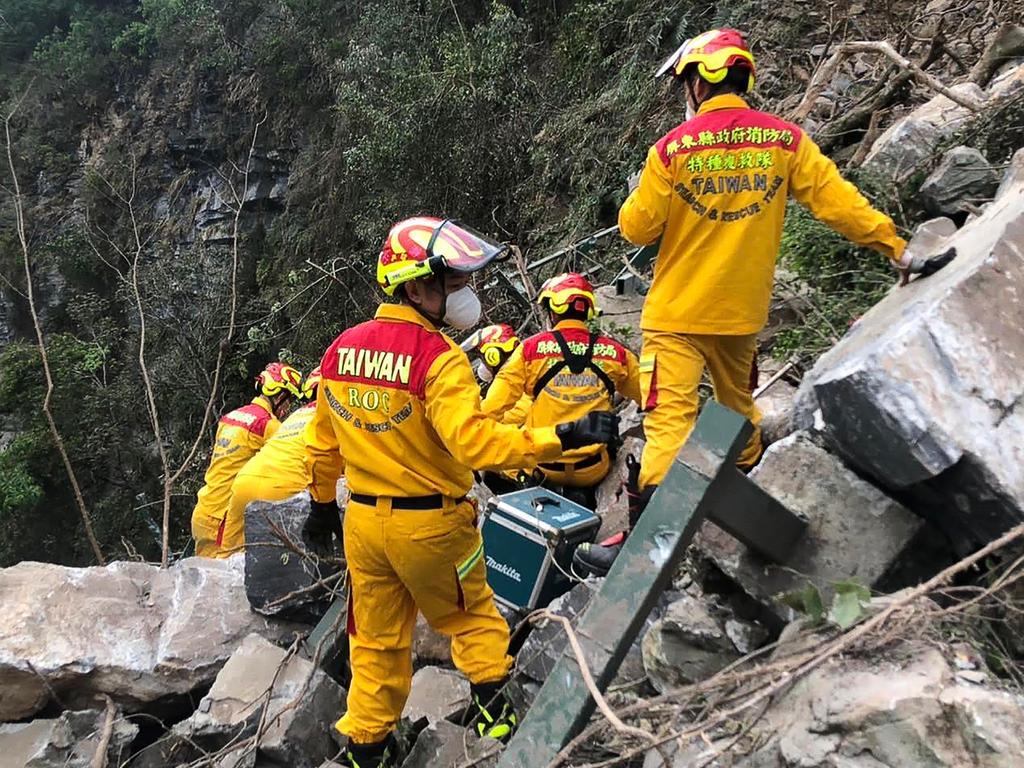 A desperate search is underway for people missing following Taiwan’s 7.4-magnitude earthquake, including two Australians. Picture: AFP