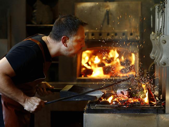 Hastie at work at his Firedoor restaurant in Surry Hills. Picture: John Appleyard