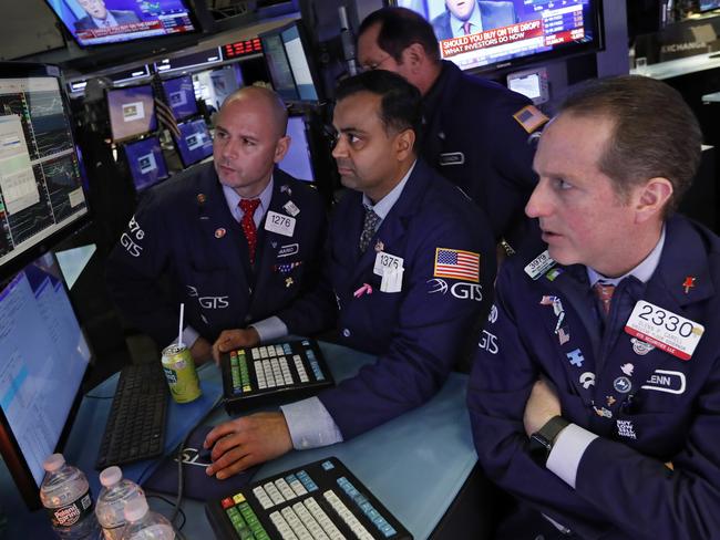 Specialists react as stocks tumble on the New York Stock Exchange. Picture: AP