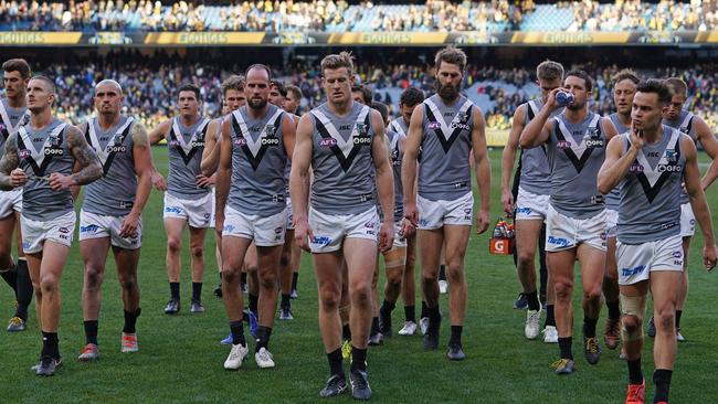 Port Adelaide leave the field after losing to Richmond. Picture: Getty Images