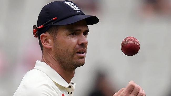 England paceman James Anderson inspects the ball on final day of the fourth Ashes cricket Test match against Australia at the MCG in Melbourne.