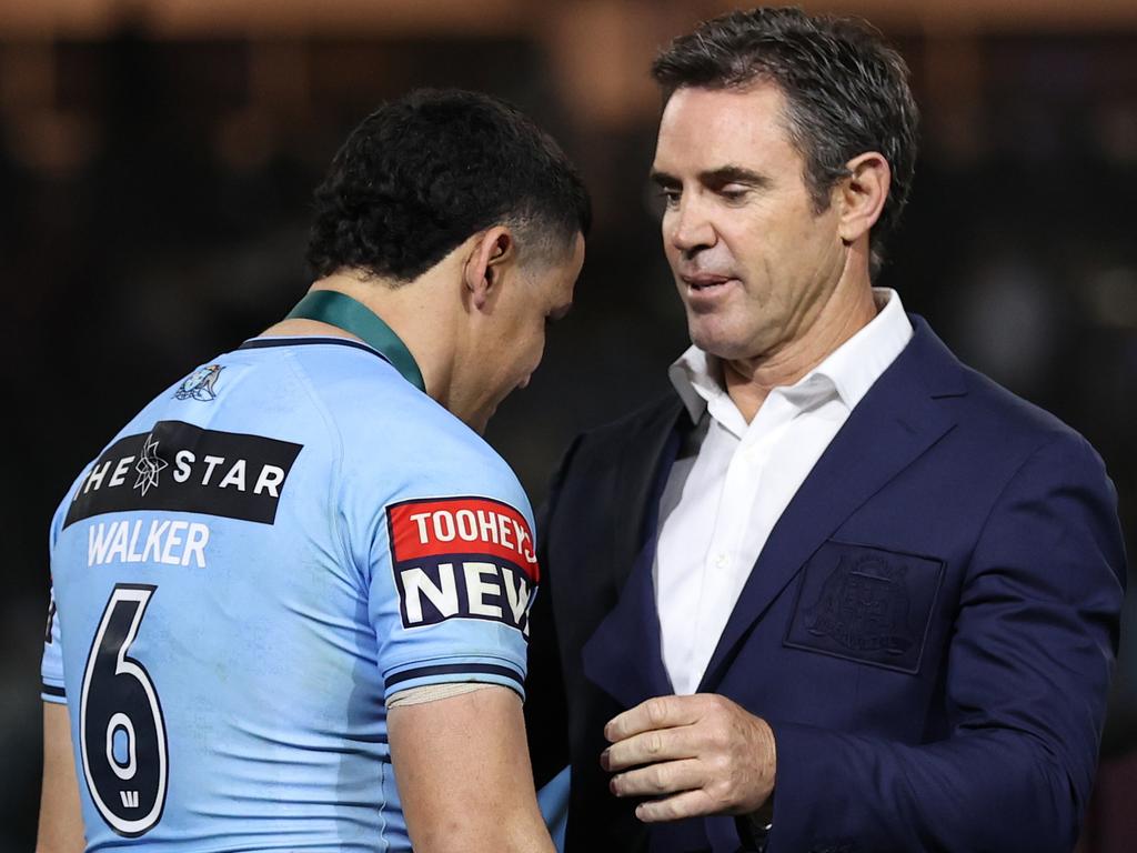 Brad Fittler presents Cody Walker the Player of the Match award. Picture: Brendon Thorne/Getty