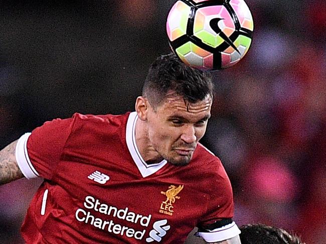 Dejan Lovren of Liverpool competes for possession with Bobo of Sydney during the exhibition match between Sydney FC and Liverpool FC at ANZ Stadium, in Sydney, Wednesday, May 24, 2017. (AAP Image/Dan Himbrechts) NO ARCHIVING, EDITORIAL USE ONLY