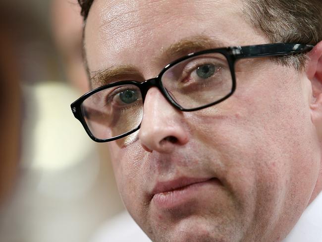 CMNEWS_Qantas CEO Alan Joyce photographed here given Queensland Premier Campbell Newman and Tourism Minister Jann Stucky inside the maintenance hangar in Brisbane this morning Tuesday Dec.09th, 2014. Pictures: Jack Tran / The Courier Mail