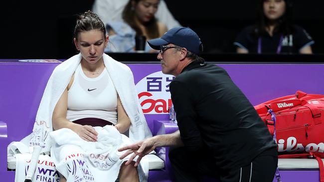 Darren Cahill during the talk to Halep. (Photo by Matthew Stockman/Getty Images)