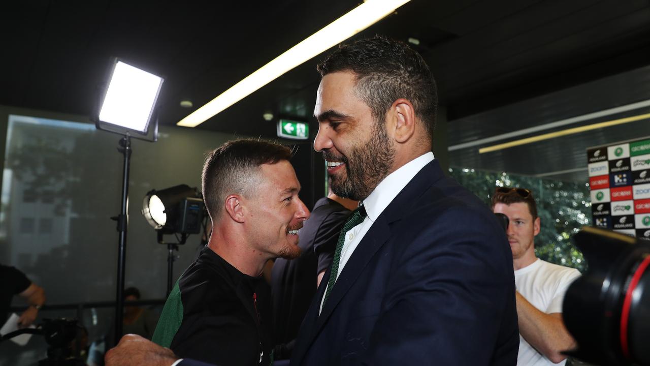 Greg Inglis embraces teammate Damien Cook at his retirement press conferece.