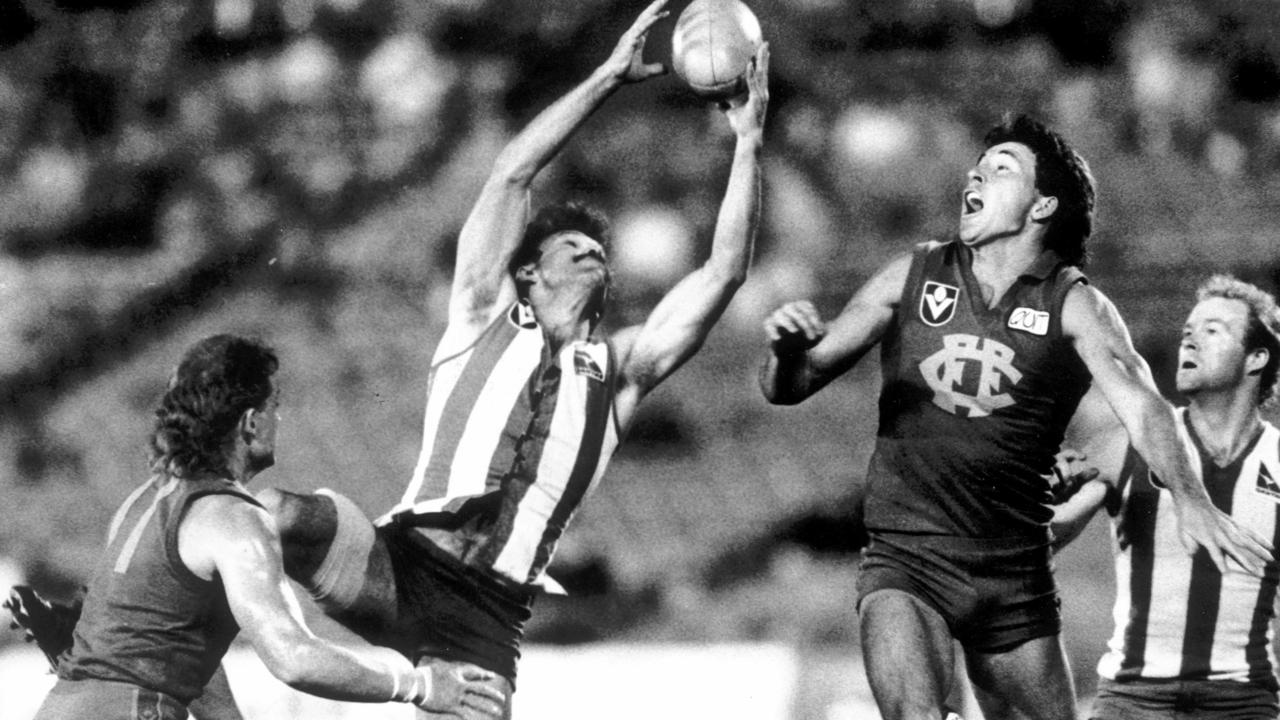 Andrew Demetriou in action for North Melbourne.