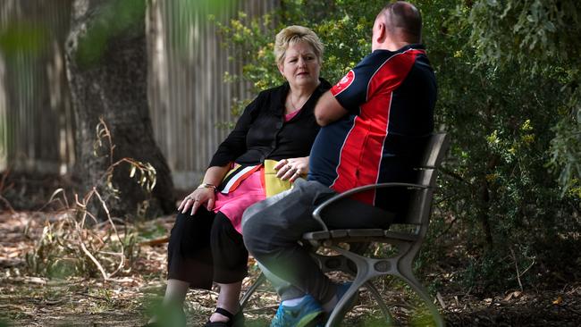 Phillipa Maloney-Walsh and Tony Cross on the seat Mrs Maloney-Walsh’s father Kevin used to love to sit on and watch the cricket. Picture: Penny Stephens