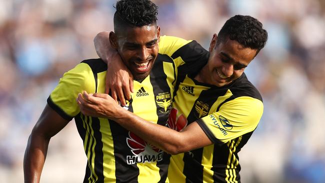 Roy Krishna celebrates with teammate Sarpreet Singh after scoring Wellington’s second goal. Picture: AAP