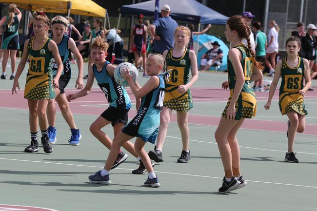 The Netball Qld Primary Schools Cup grand finals are being held at the Hinterland District Netball Association at Mudgeeraba. Homies (home schooled kids) player Tasmin McGree in action against Gilston. Picture: Mike Batterham.