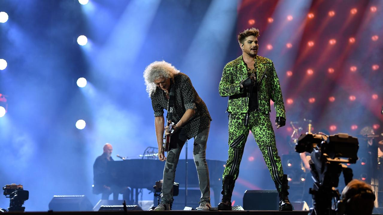 Brian May (left) and Adam Lambert of Queen were one of the headline acts at Fire Fight Australia at Sydney’s ANZ Stadium. Picture: AAP