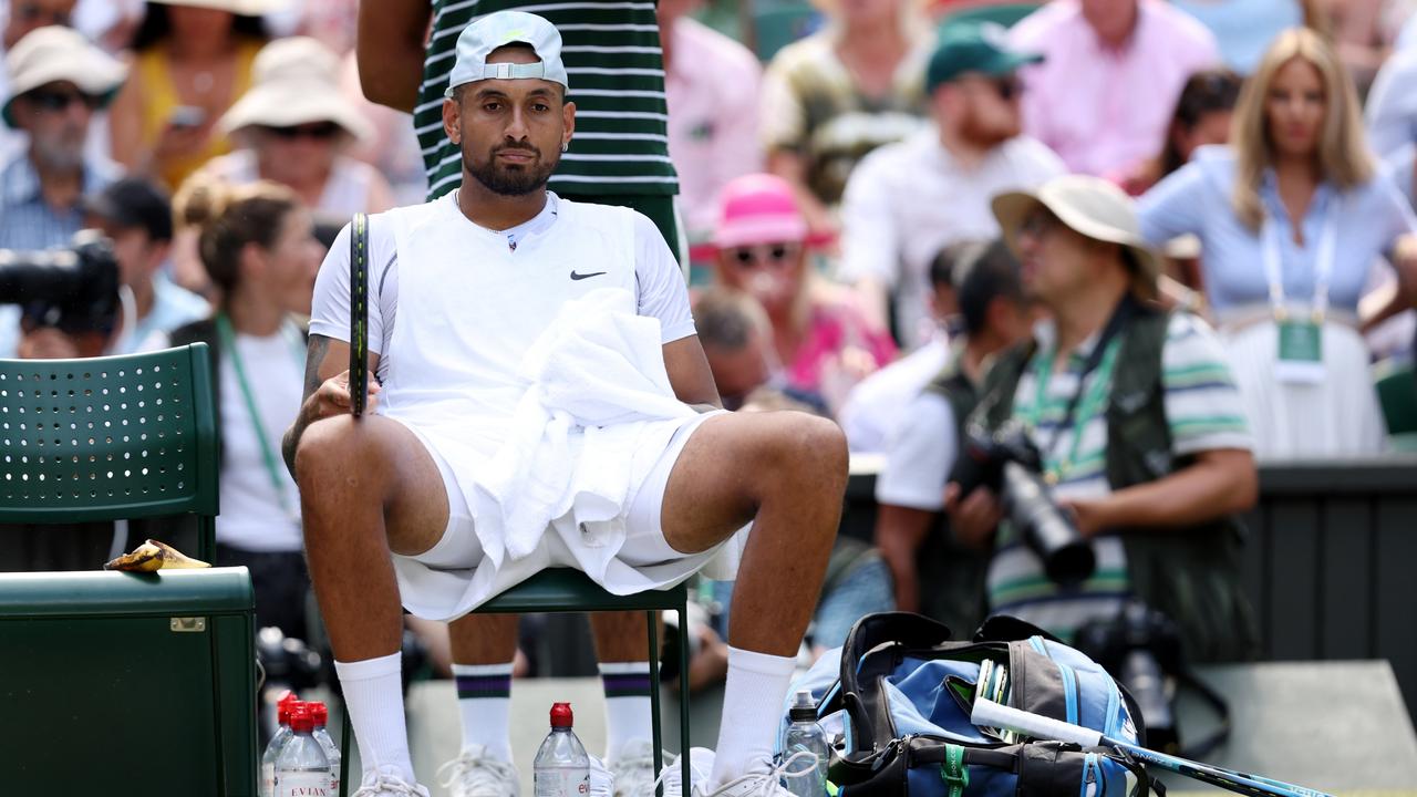 Nick Kyrgios collapsed after his high emotions. Photo by Clive Brunskill/Getty Images.