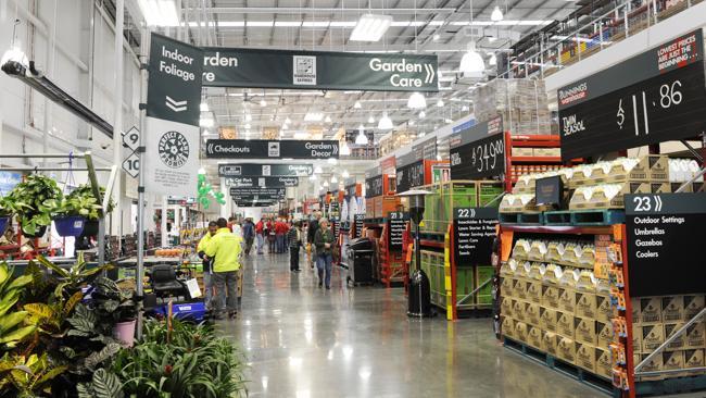 Staff and customers at a Bunnings Warehouse.