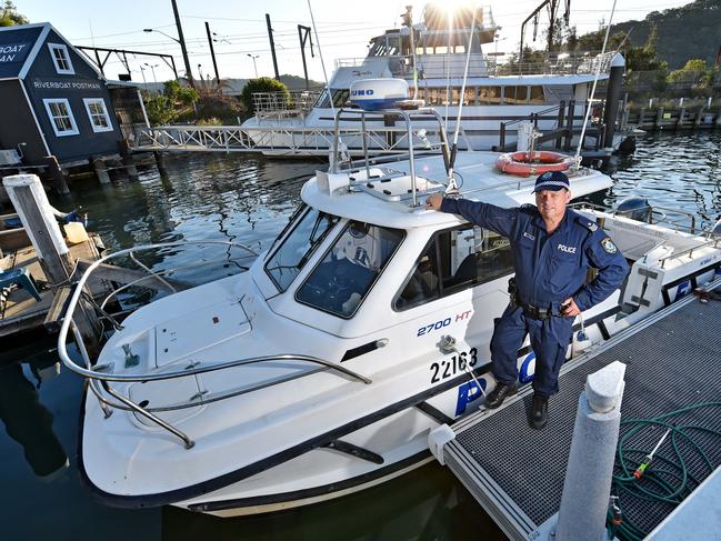 HORNSBY ADVOCATE/AAP. Sergeant David Lowden on the Hornsby Police boat at Brooklyn on Tuesday, May 14. Ku-Ring-Gai Police have a few officers who patrol the Hawkesbury River a couple of times a week, serving the remote communities on the river. AAP IMAGE / Troy Snook)