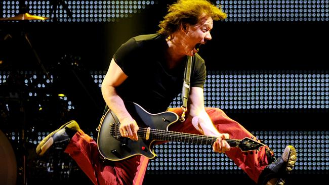 Musician Eddie Van Halen of Van Halen performs at their dress rehearsal for family and friends at the Forum on February 8, 2012 in Inglewood, California. Picture: Kevin Winter