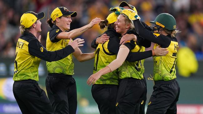 Australia’s players celebrate a wicket against India. Picture: AAP