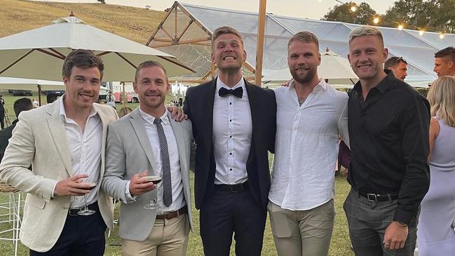 Essendon teammates Zach Merrett, Devon Smith, Michael Hurley, Jake Stringer and Jayden Laverde at Michael Hurley's wedding. Picture: Instagram