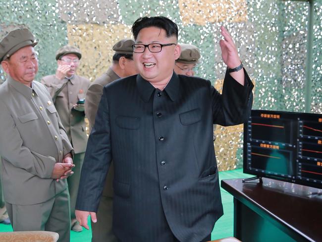 North Korean leader Kim Jong-un pictured last June inspecting a test of the surface-to-surface medium long-range strategic ballistic missile Hwasong-10 at an undisclosed location in North Korea. Picture: AFP