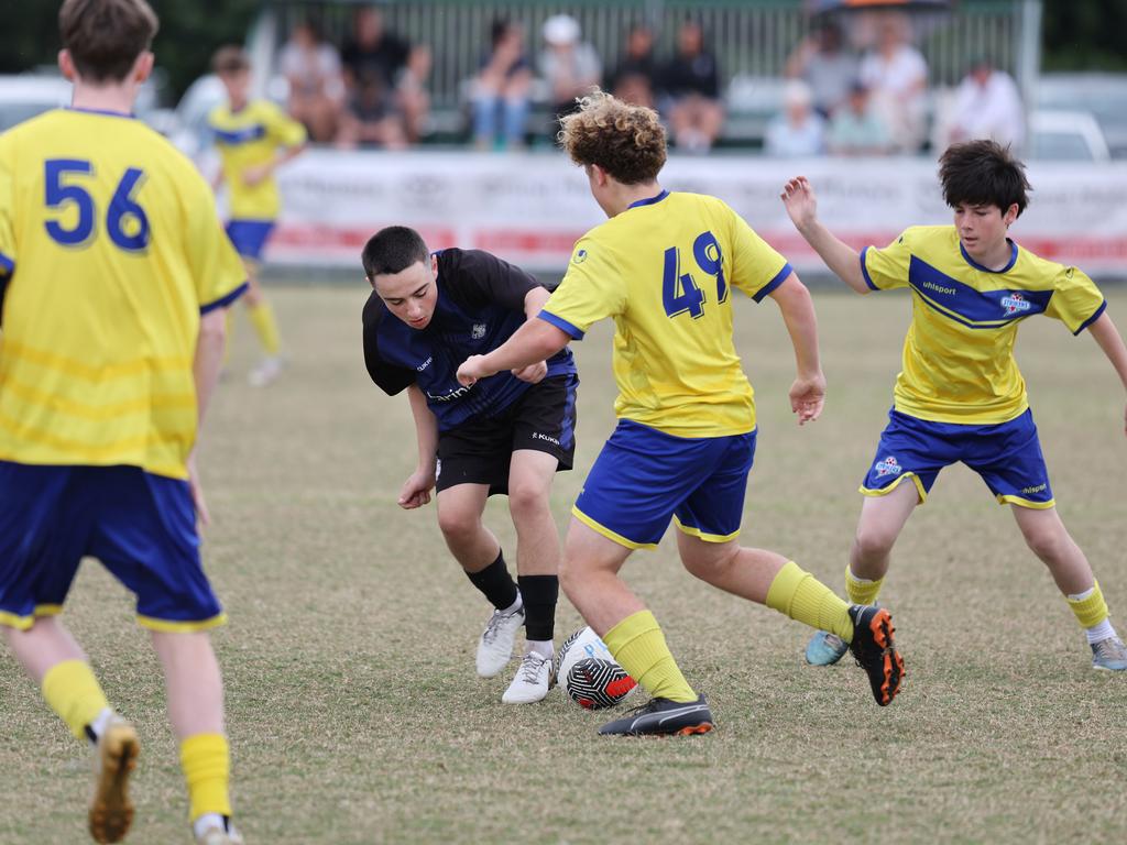 Premier Invitational Football 2024 tournament at Glennon Park Nerang. Field 1...Selwyn Utd (blue) V Brisbane Strikers (Yellow). Picture Glenn Hampson