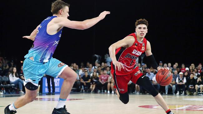 LaMelo Ball drives to the ring against Finn Delany.