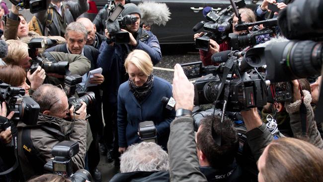 Swedish prosecutor Ingrid Isgren is surrounded by media as she arrives to attend an interview with WikiLeaks founder Julian Assange at the Ecadorian Embassy in London. Picture: AP.