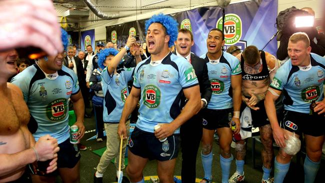 NSW's Jarryd Hayne sings the team song in the rooms after winning Game 2 of the 2014 State of Origin series at ANZ Stadium