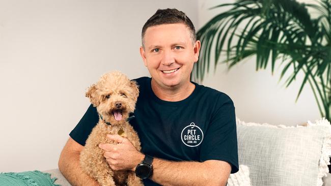 Pet Circle CEO Mike Frizell, with dog Kobe, says its taken the company a decade to create a pet insurance policy it can stand behind.