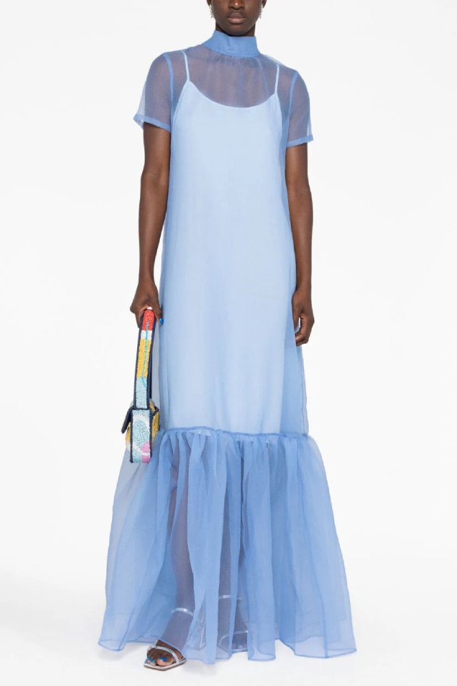 <h3><a href="https://www.farfetch.com/au/shopping/women/staud/items.aspx" target="_blank" rel="nofollow noopener"><b>Staud</b></a></h3><p>To hell with restraint, dresses for spring weddings should be fun. Provided you&rsquo;ve gotten a black tie memo, we&rsquo;d struggle to think of a ceremony where we wouldn&rsquo;t wear this maxi dress from Staud. The frothy, periwinkle organza is to die for&mdash;bold, certainly, but not ostentatious&mdash;while the bow at the back will ensure you make as much of an impact leaving as you do arriving.</p><p><b>Length:</b> Maxi |<b> Material:</b> Cotton and polyester | <b>Delivery: </b>Free over $300</p><p><b>SHOP NOW: </b>Staud Calluna organza maxi dress, $790 from <a href="https://www.farfetch.com/au/shopping/women/staud-calluna-organza-maxi-dress-item-20161084.aspx" target="_blank" rel="nofollow noopener"><strong>Farfetch</strong></a></p>