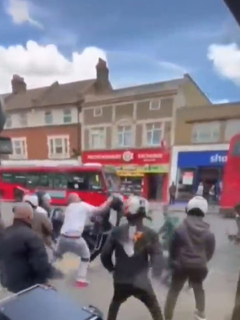 The wild brawl broke out between warring McDonald's drivers outside an outlet in south London. Picture: Twitter.