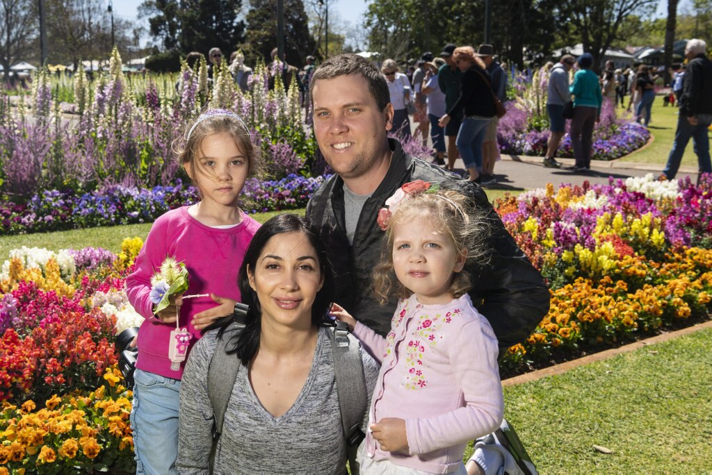 Ben and Inna Hall with their daughters Sophia (left) and Victoria in Queens Park during Carnival of Flowers 2020, Saturday, September 26, 2020. Picture: Kevin Farmer