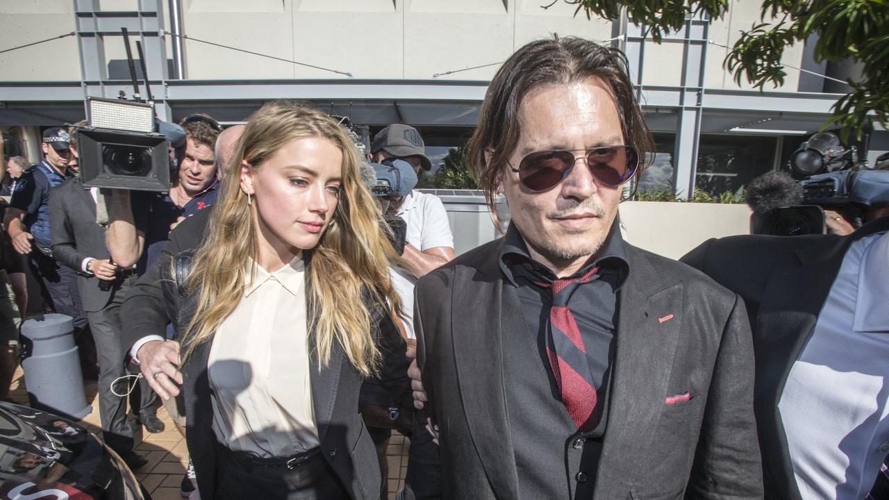 Johnny Depp and wife Amber Heard leave The Southport Court, Southport, Queensland, . (AAP Image/Glenn Hunt)
