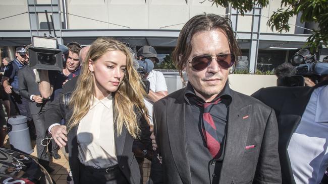 Johnny Depp and wife Amber Heard leave The Southport Court, Southport, Queensland, . (AAP Image/Glenn Hunt)