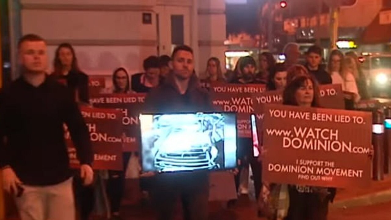 The protesters marched through the suburb of Leederville with screens. Picture: Channel 9