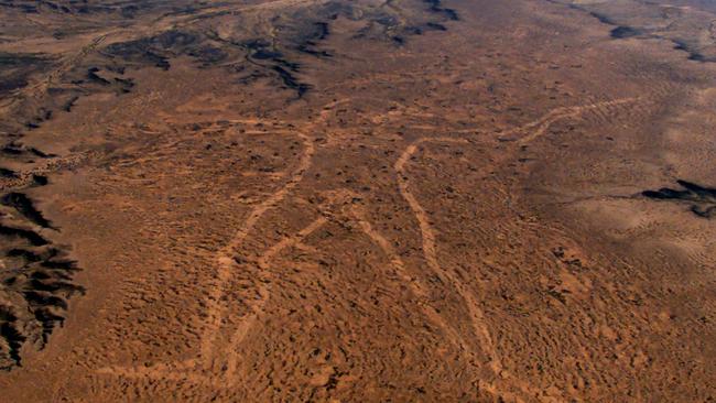 D/I Aerial view of fading giant mystery drawing "Marree Man" of Aborigine carved on desert plateau outside Marree in SA mid-north 22 Jun 2001. hoax aboriginal art