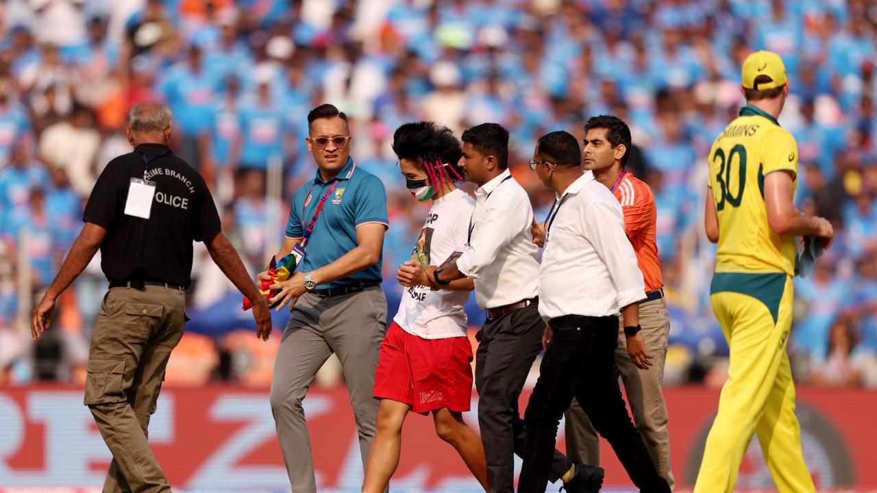 They were eventually led away by security as the match resumed. (Photo by Robert Cianflone/Getty Images)