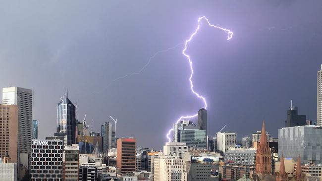 Lightning over Melbourne on Friday evening. Picture: Cameron Tandy