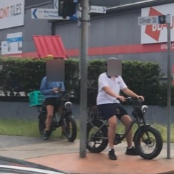 Two riders on e-bikes on the corner of Pittwater Rd and Oliver st, Freshwater, on Tuesday. Picture: Manly Daily